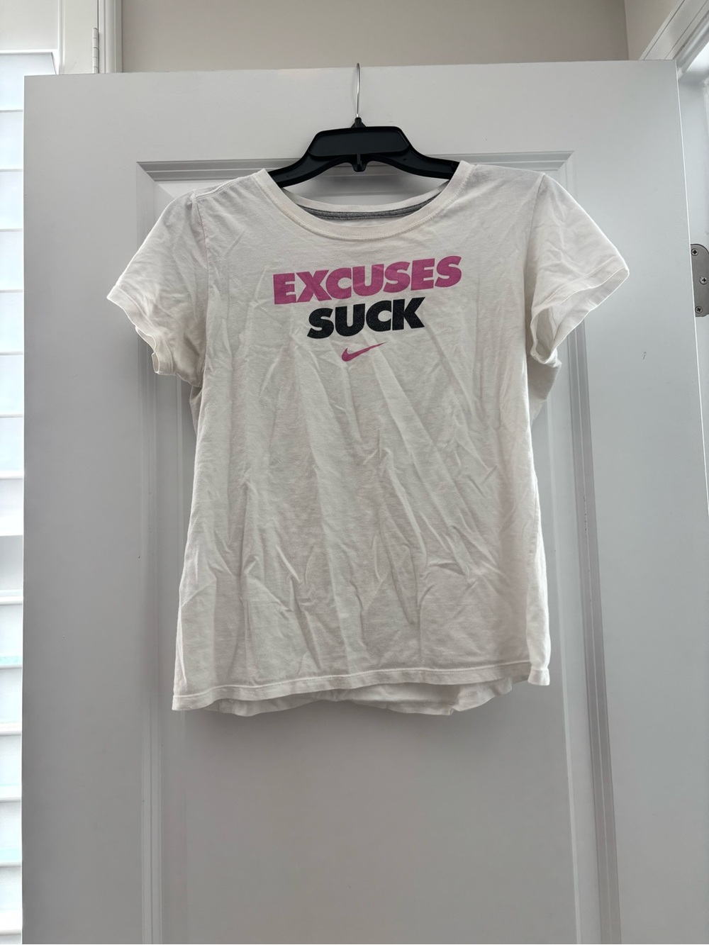 Nike Women’s White Short-Sleeve Graphic Tee with Pink & Black Text